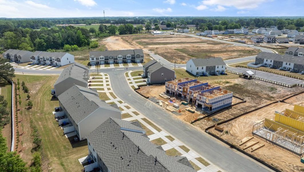 Aerial view of the The Townes at Honeycutt Oaks community in Angier, NC, showing layout and nearby surroundings (Image 12).