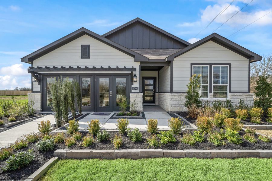 A house with a driveway. A house with a driveway.