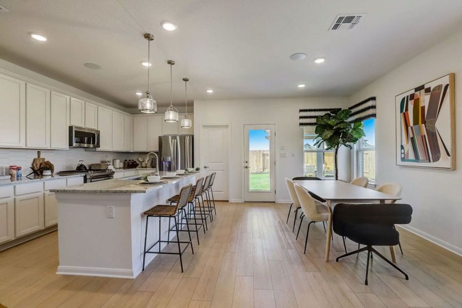 Furnished interior in a model home at Village at Three Oaks in Seguin (Image 18).