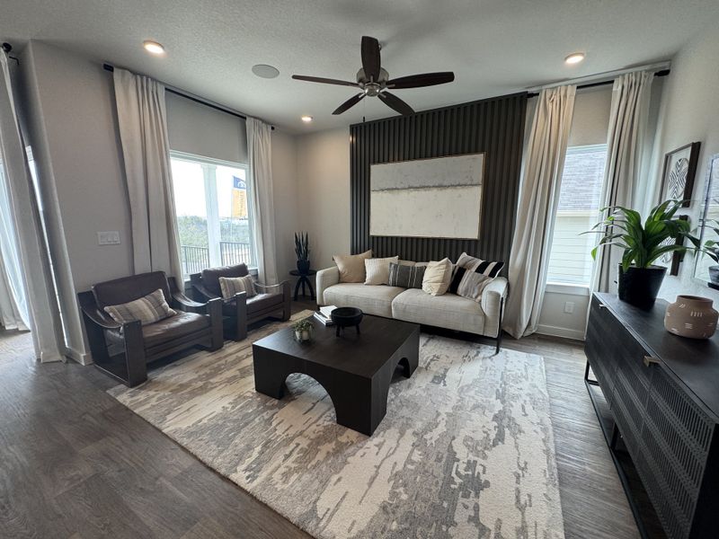 A modern living room with a neutral palette, featuring cozy seating, a sleek coffee table, and stylish decor accents. A modern living room with a neutral palette, featuring cozy seating, a sleek coffee table, and stylish decor accents.