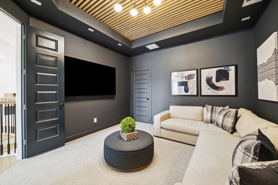 Furnished interior in a model home at Audubon - 70' in Magnolia (Image 17).