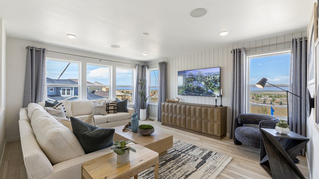 Experience luxury modern design in this single-family home's exquisite living room architecture.