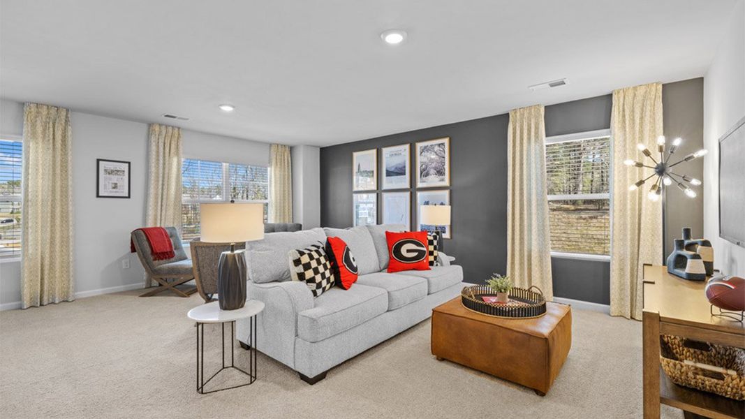 Furnished interior in a model home at Garden Lakes in Hampton (Image 10).