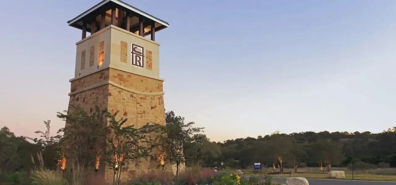 Main entrance to the Johnson Ranch master-planned community in Bulverde, TX, featuring its landmark signage (Image 2). Main entrance to the Johnson Ranch master-planned community in Bulverde, TX, featuring its landmark signage (Image 2).