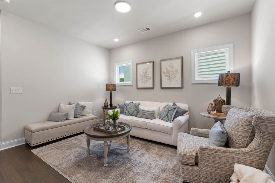 Furnished interior in a model home at Palisades Single Family in Cumming (Image 13).