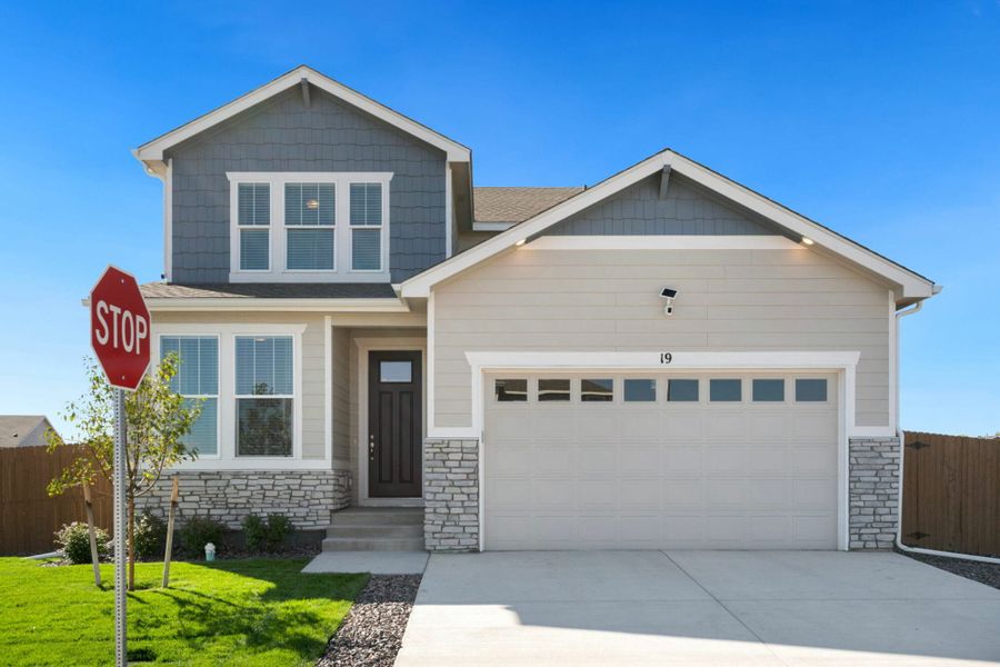 Front exterior of a home in the Lochbuie Station – Jewel Collection community, located in Lochbuie, CO (Image 1).