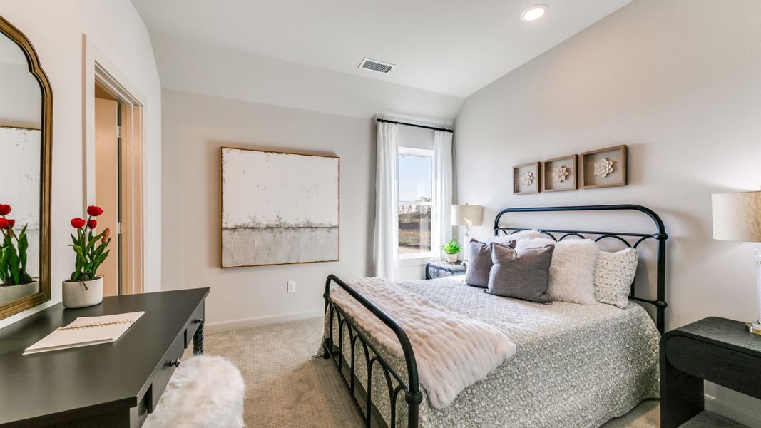 Furnished interior in a model home at Estates at Stacy Crossing in McKinney (Image 42).