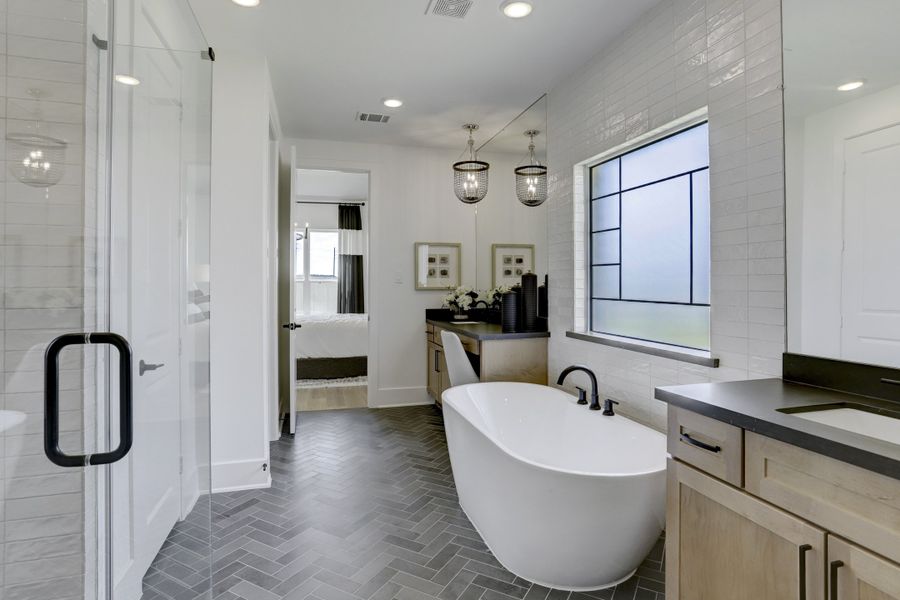 Furnished interior in a model home at Sunterra (Katy ISD) in Katy (Image 15).