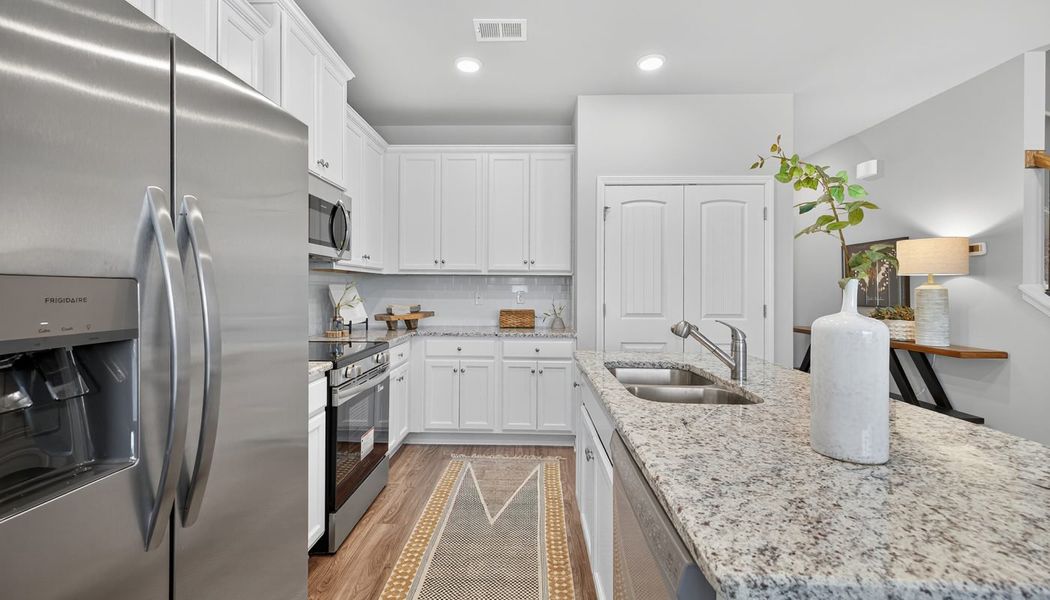 Furnished interior in a model home at The Reserve at Clocktower in Douglasville (Image 19).