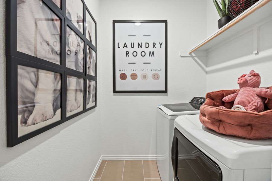 Furnished interior in a model home at El Dorado in Granbury (Image 30).