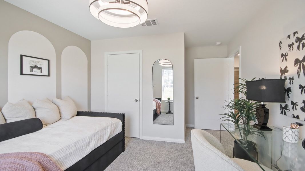 Furnished interior in a model home at Gemini in Splendora (Image 6).