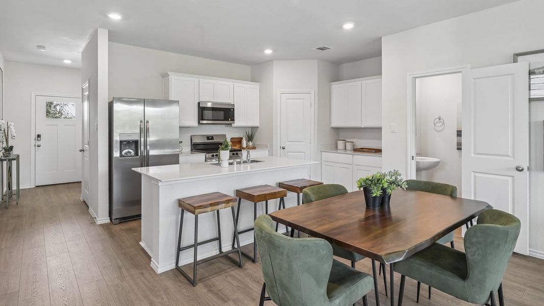 Furnished interior in a model home at Stonewood in Sulphur Springs (Image 5).