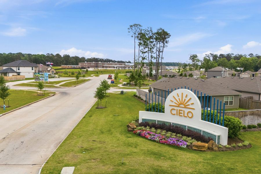 Entrance to the Cielo community in Conroe, TX, featuring signage and landscaping (Image 2). Entrance to the Cielo community in Conroe, TX, featuring signage and landscaping (Image 2).