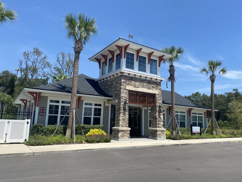 A charming community center at Wilford Oaks by Dream Finders Homes, featuring stone accents and palm trees in Orange Park, FL. A charming community center at Wilford Oaks by Dream Finders Homes, featuring stone accents and palm trees in Orange Park, FL.