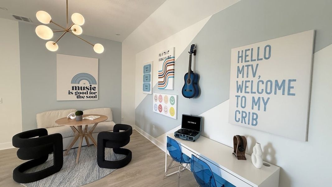 Furnished interior in a model home at Persimmon in Buda (Image 13).