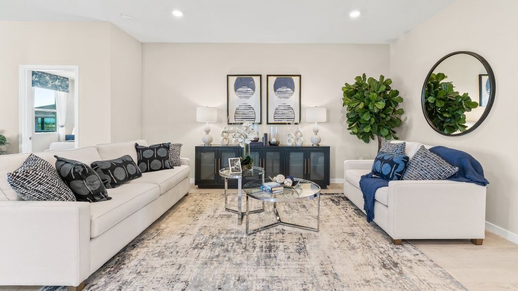 Furnished interior in a model home at Coral Lakes - Tradition & Express in Punta Gorda (Image 17).