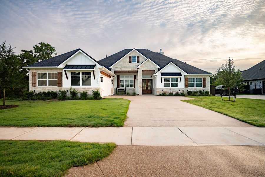 Front exterior of a home in the Pebble Creek community, located in College Station, TX (Image 1). Front exterior of a home in the Pebble Creek community, located in College Station, TX (Image 1).