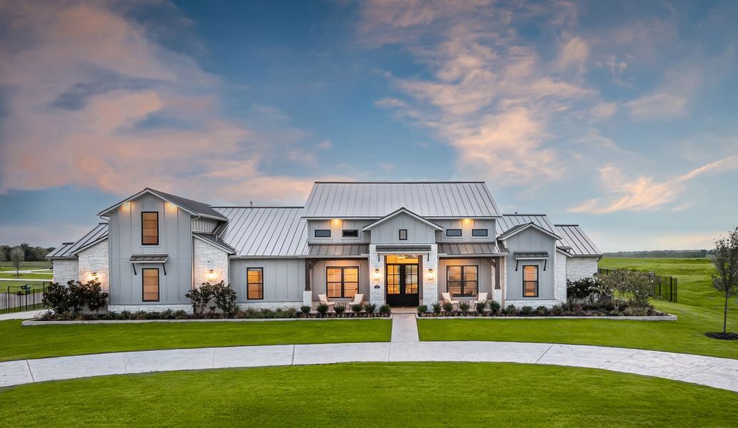 Front exterior of a home in the Aune Ranch community, located in Copper Canyon, TX (Image 11).