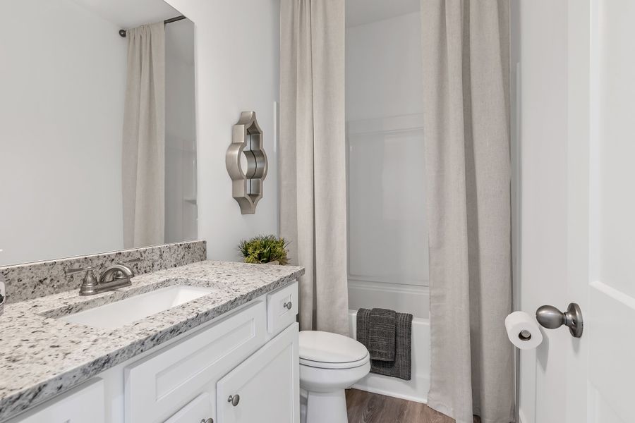 Furnished interior in a model home at Langston Place in Perry (Image 15).