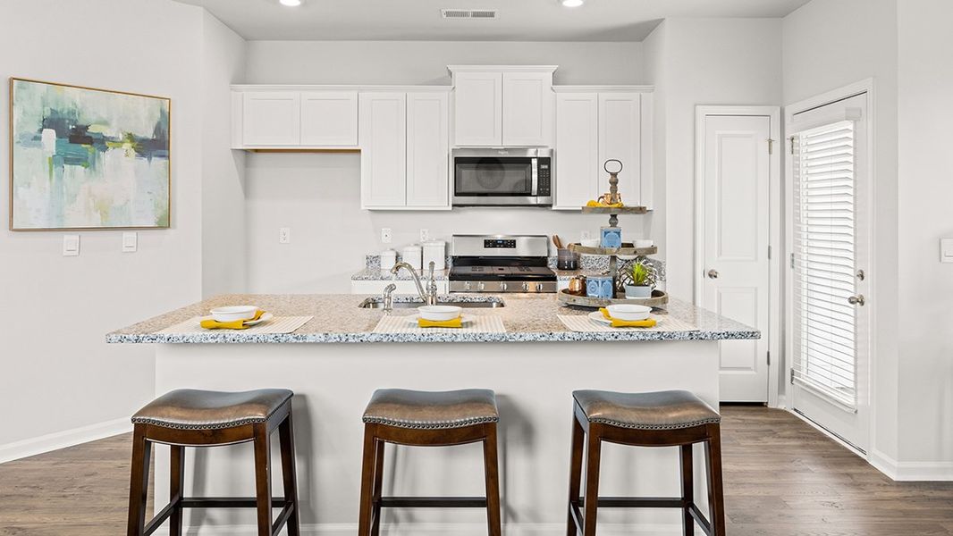 Furnished interior in a model home at The Parish at Flat Rock Townhomes in Graniteville (Image 4).
