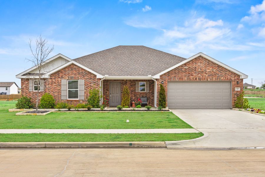 A house with a driveway. A house with a driveway.