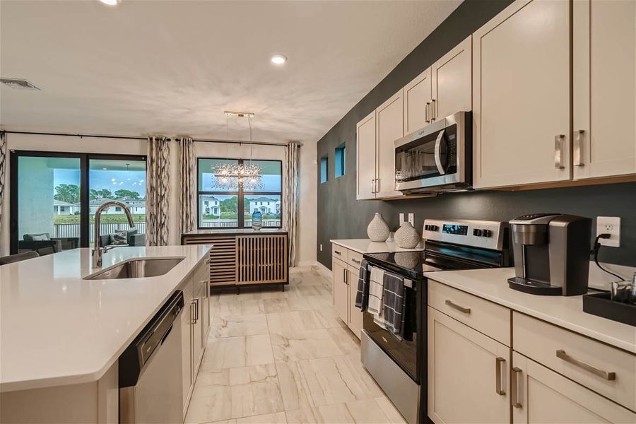 Furnished interior in a model home at Willow Pointe in Stuart (Image 39).