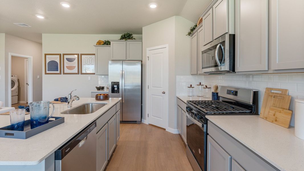 Furnished interior in a model home at Kokomo in Rockport (Image 8).