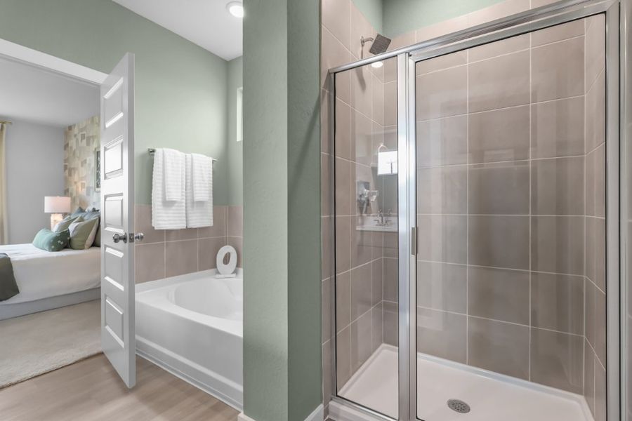 A bathroom with a glass shower. A bathroom with a glass shower.