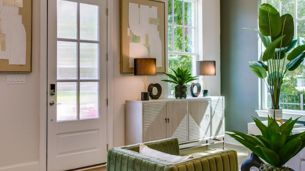 Furnished interior in a model home at 1897 Townhomes in Plano (Image 18).