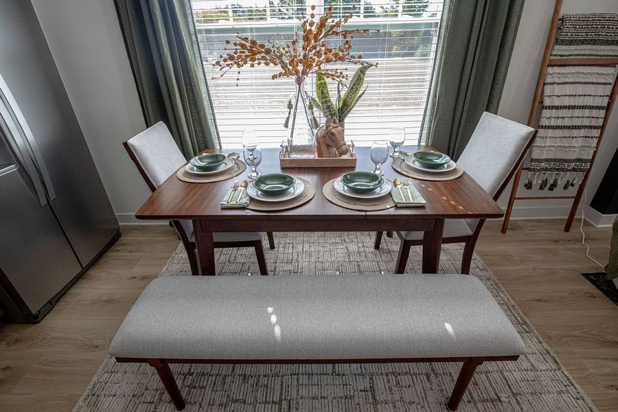 Furnished interior in a model home at The Townhomes at Union Depot in Bartlett (Image 6).