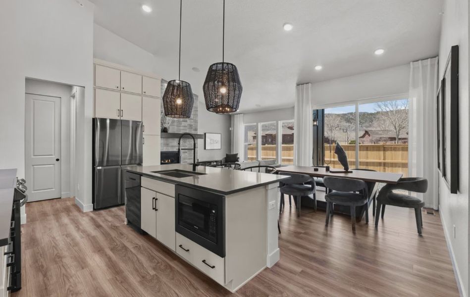 Furnished interior in a model home at Deer Creek in Littleton (Image 7).
