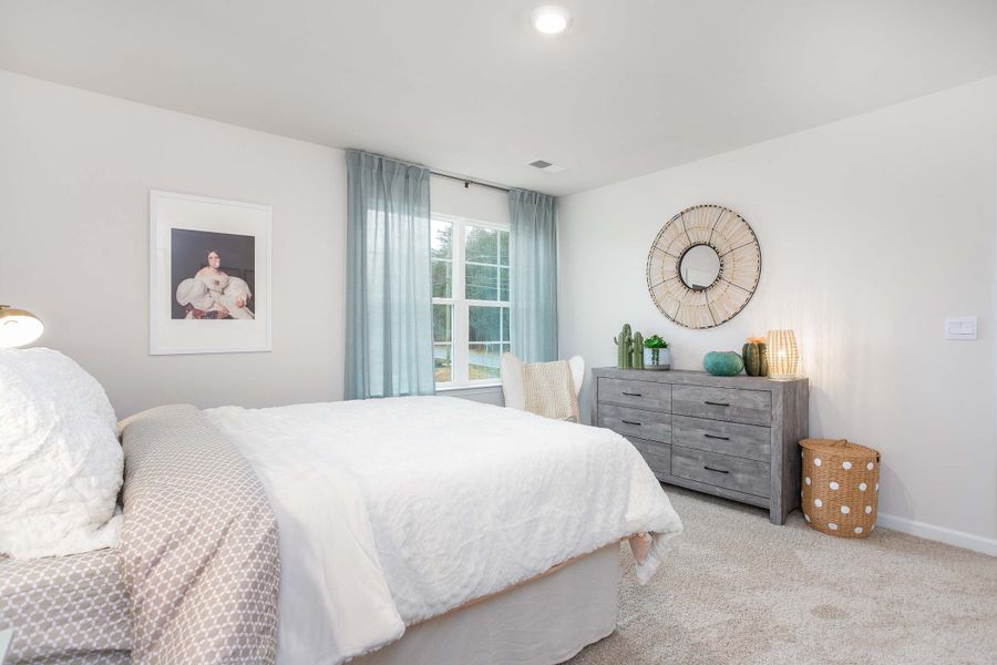 Furnished interior in a model home at Ridge Pointe in Trinity (Image 30).