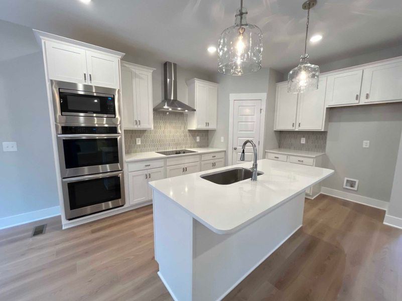 Furnished interior in a model home at Saundersville Station in Hendersonville (Image 5).