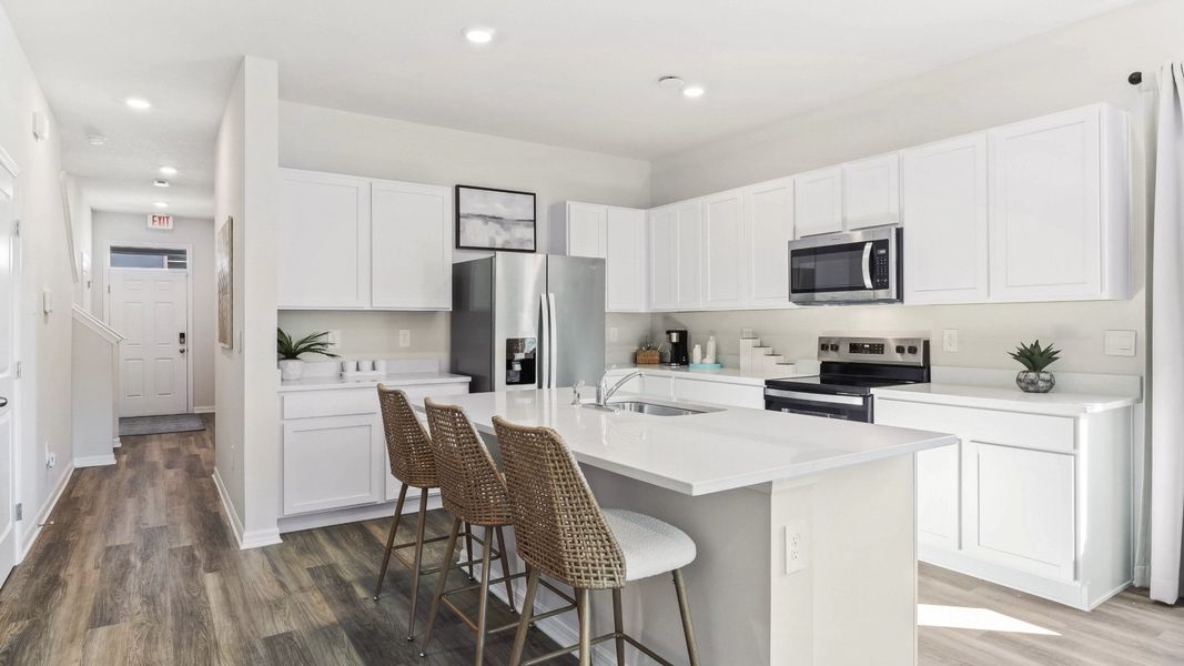 Furnished interior in a model home at The Gardens at Bay Street in Sarasota (Image 10).