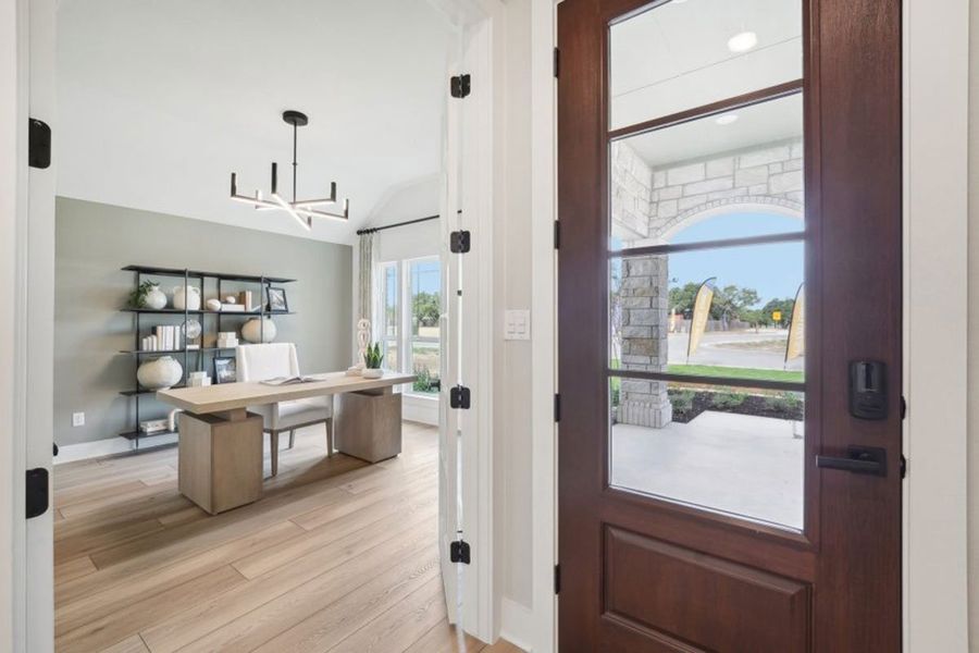 Furnished interior in a model home at Grande Estates in Bertram (Image 16).