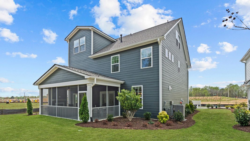 Front exterior of a home in the Station Pointe Phase 2 community, located in Angier, NC (Image 13).