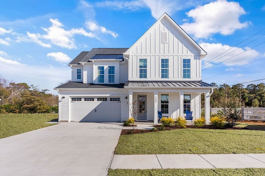 Front exterior of a home in the WyndWater community, located in Hampstead, NC (Image 22).
