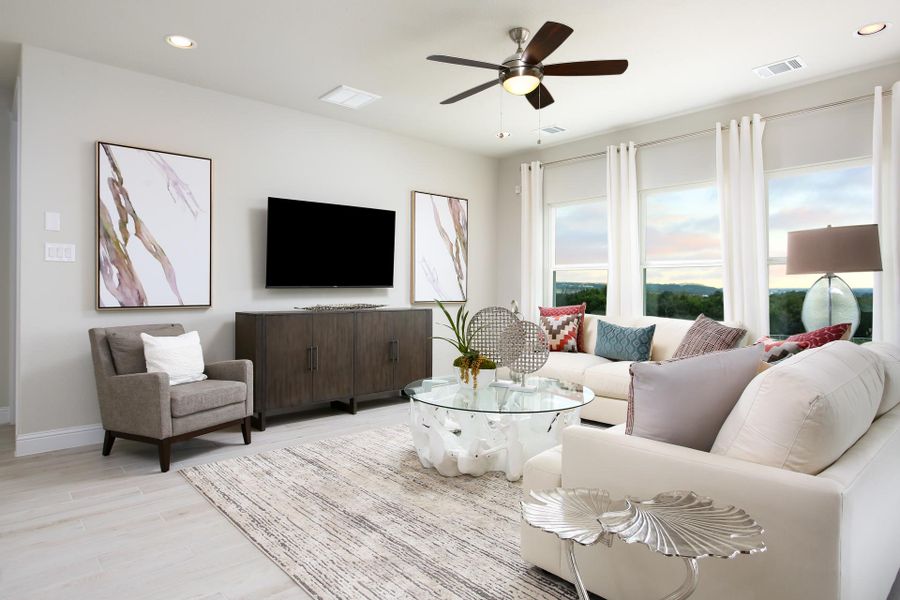 Furnished interior in a model home at Cloverleaf in Austin (Image 59).