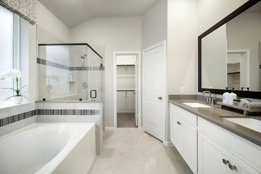 Furnished interior in a model home at Sunterra: Landmark Collection in Katy (Image 16). Furnished interior in a model home at Sunterra: Landmark Collection in Katy (Image 16).