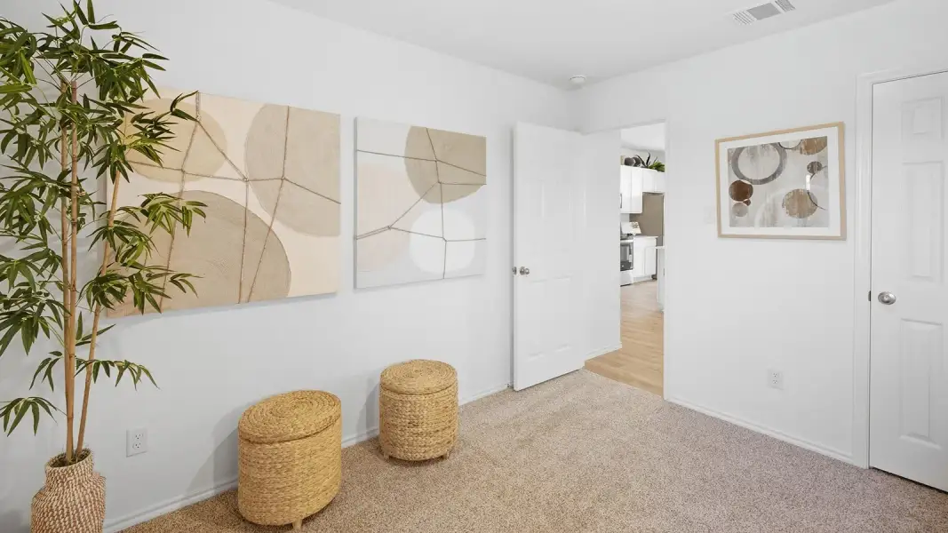 Furnished interior in a model home at Wildwood Estates in Nolanville (Image 31).