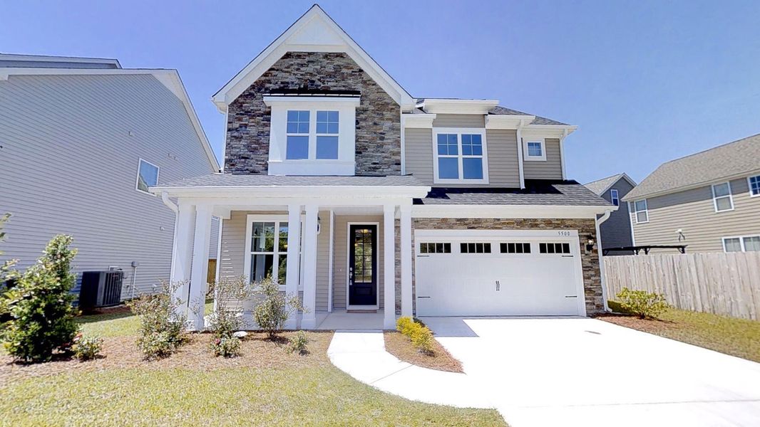 Front exterior of a home in the Laurenbridge - Robuck Homes community, located in Garner, NC (Image 3). Front exterior of a home in the Laurenbridge - Robuck Homes community, located in Garner, NC (Image 3).