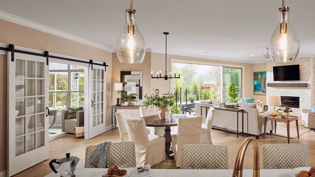 Furnished interior in a model home at The Courtyards at Wimberly in Apex (Image 4).