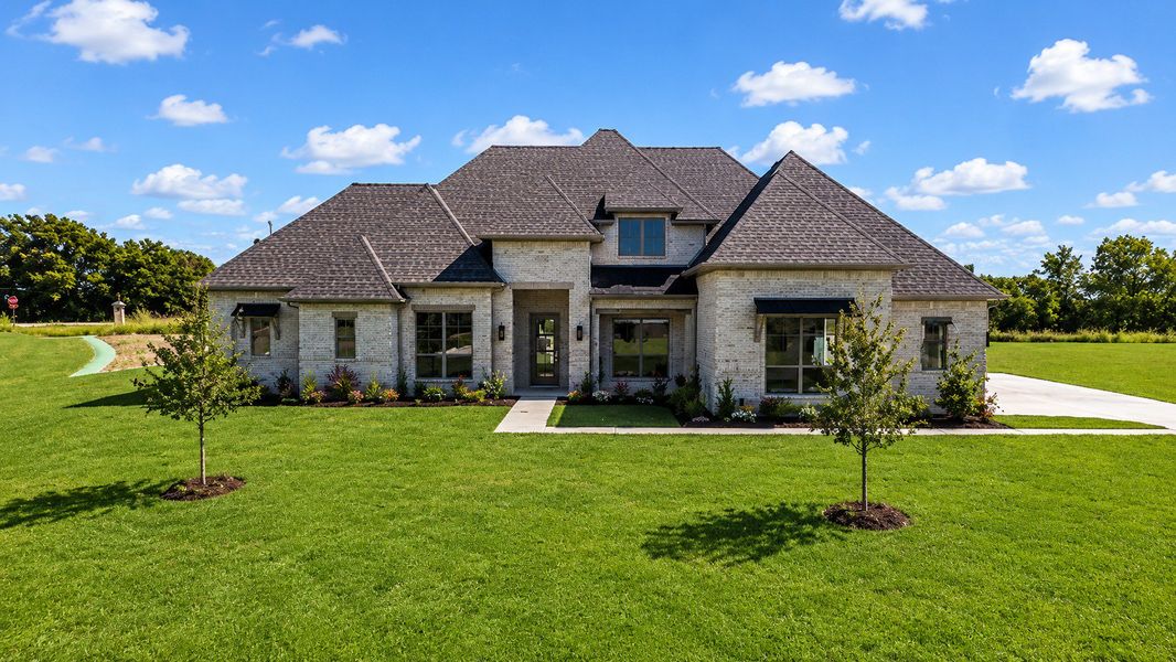 Front exterior of a home in the Tuscan Estates community, located in Waxahachie, TX (Image 1). Front exterior of a home in the Tuscan Estates community, located in Waxahachie, TX (Image 1).