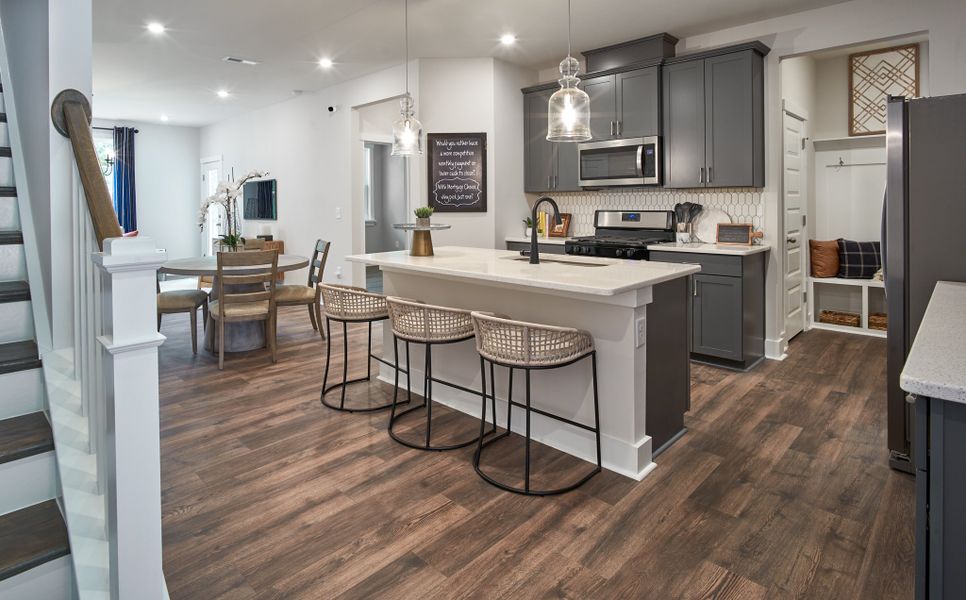 Furnished interior in a model home at Friendship Village Townes in Apex (Image 7).