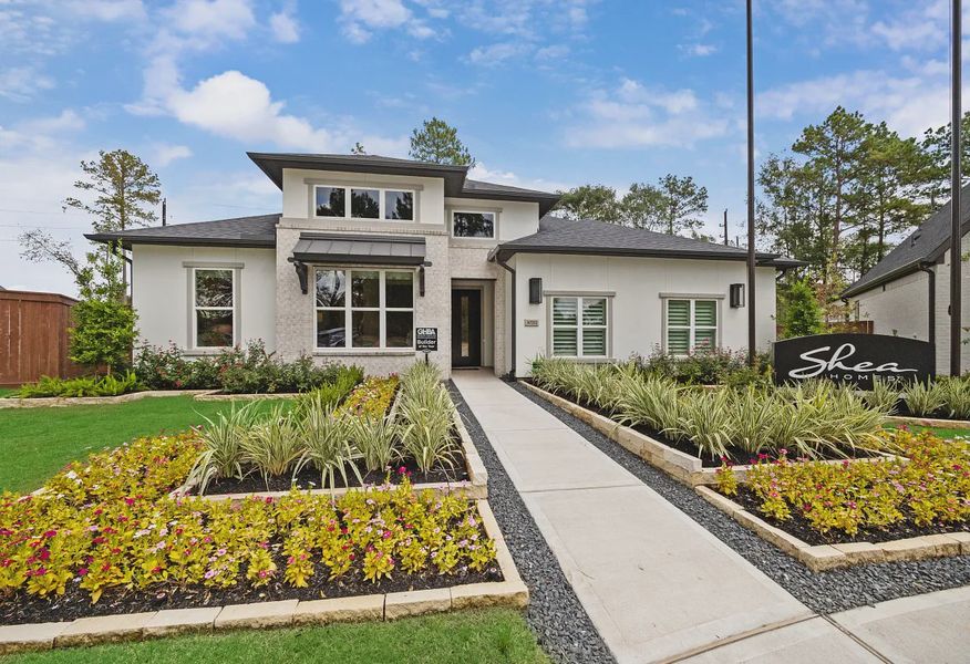 Plan 5042 model exterior - 1 of 15 Plan 5042 model exterior - 1 of 15