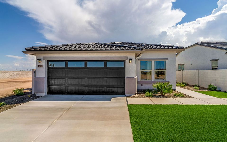 Front exterior of a home in the Rancho Santa Rosa community, located in Maricopa, AZ (Image 12).