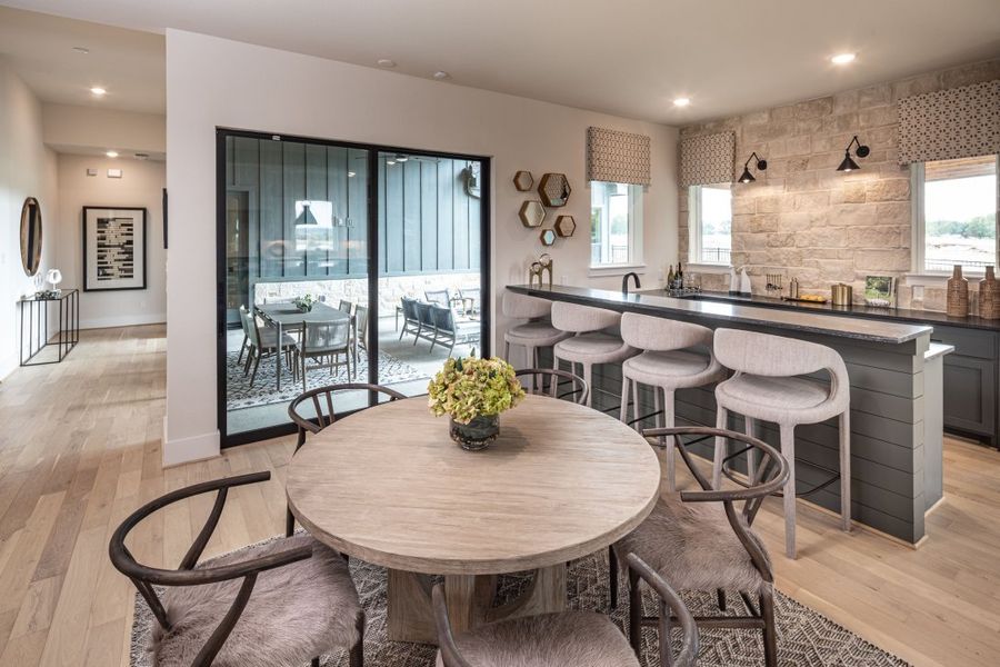 Furnished interior in a model home at Bluff Hollow in Plano (Image 7).