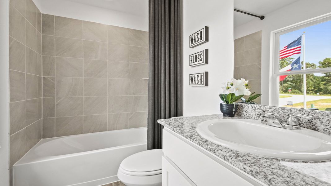 Furnished interior in a model home at McCrorey Trails in Conroe (Image 12).