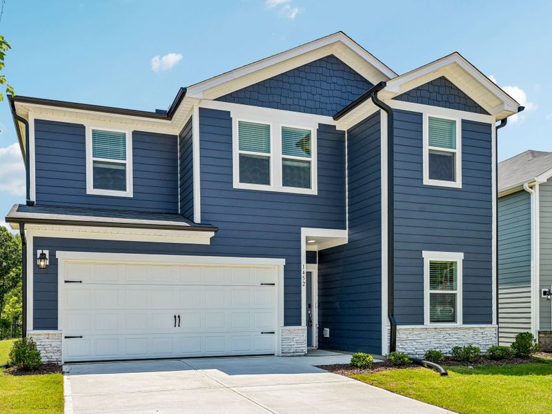 Front exterior of a home in the The Heritage at Buffaloe Reserve community, located in Raleigh, NC (Image 2). Front exterior of a home in the The Heritage at Buffaloe Reserve community, located in Raleigh, NC (Image 2).