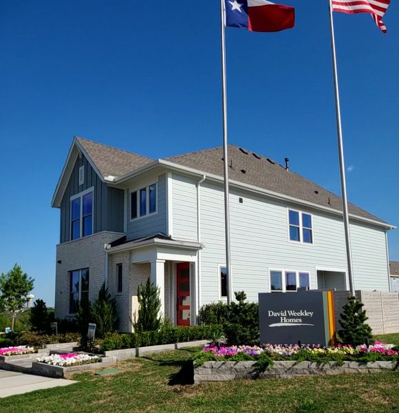 A lovely modern home with landscaped yard in Painted Tree West – Village by David Weekley Homes (McKinney, TX).